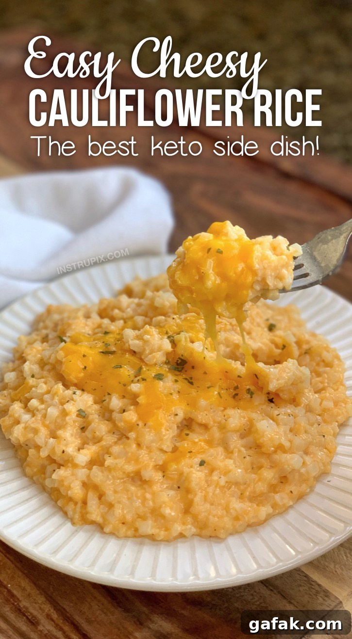 Quick and easy low carb side dish recipe: Keto Cheesy Cauliflower Rice made with cheddar, butter, cream cheese, milk and seasoning to taste.