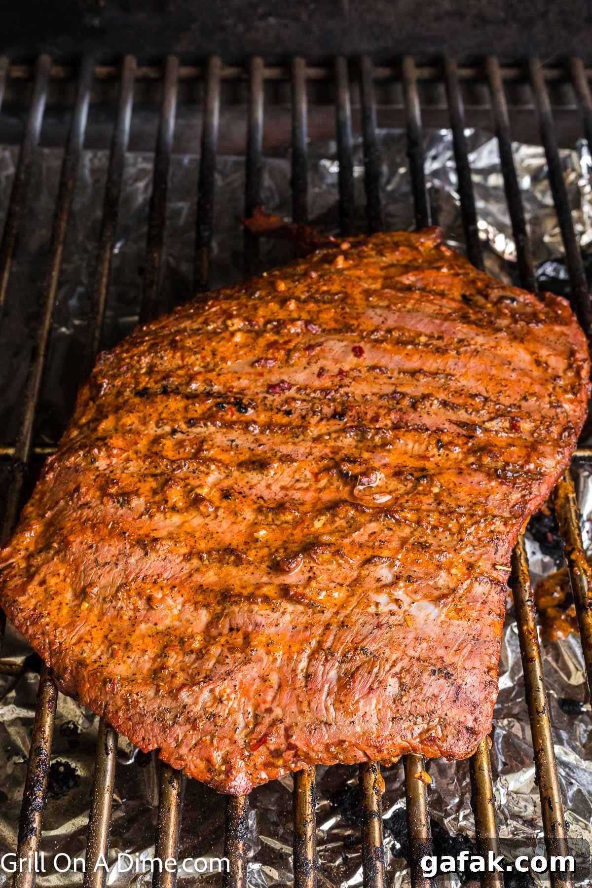 Chipotle Steak Recipe: Smoky Grilled Steak with Chili-Lime Rub 7 Grilled Chipotle Steak on the grill