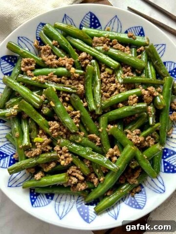 green beans and ground beef stir-fry on plate