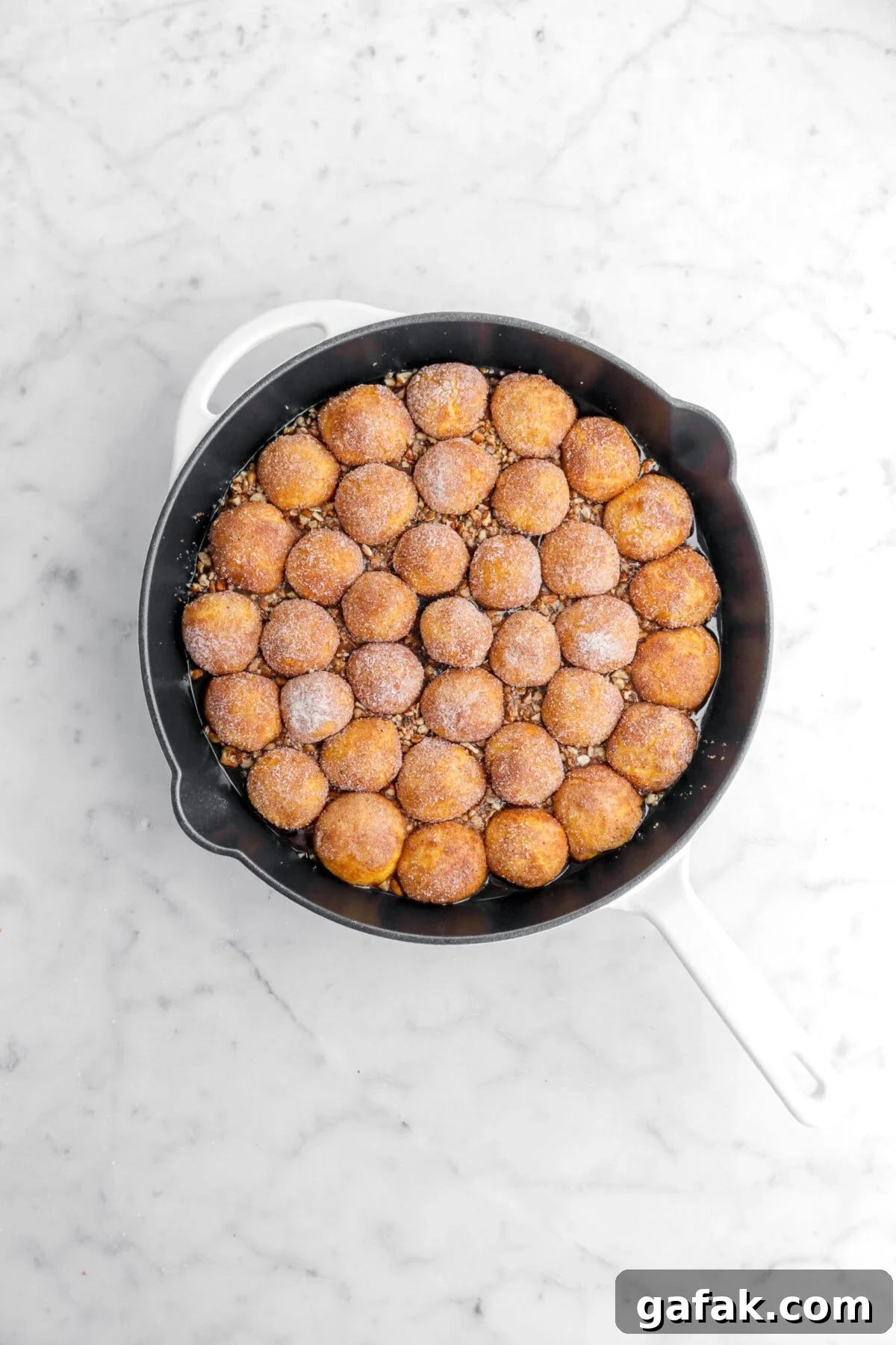 dough balls in skillet.
