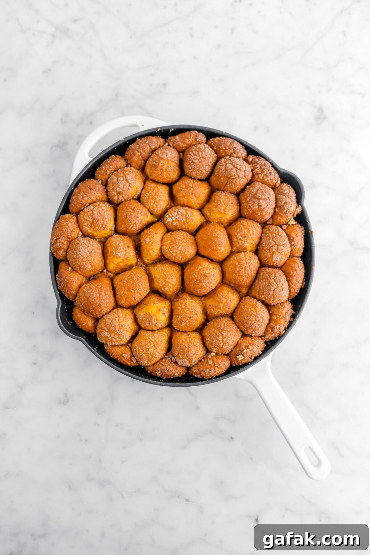 baked pumpkin monkey bread in skillet.