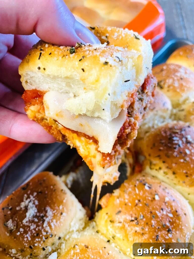 Crispy Shrimp Po' Boy Sandwich Recipe 11 slider with melted cheese pull