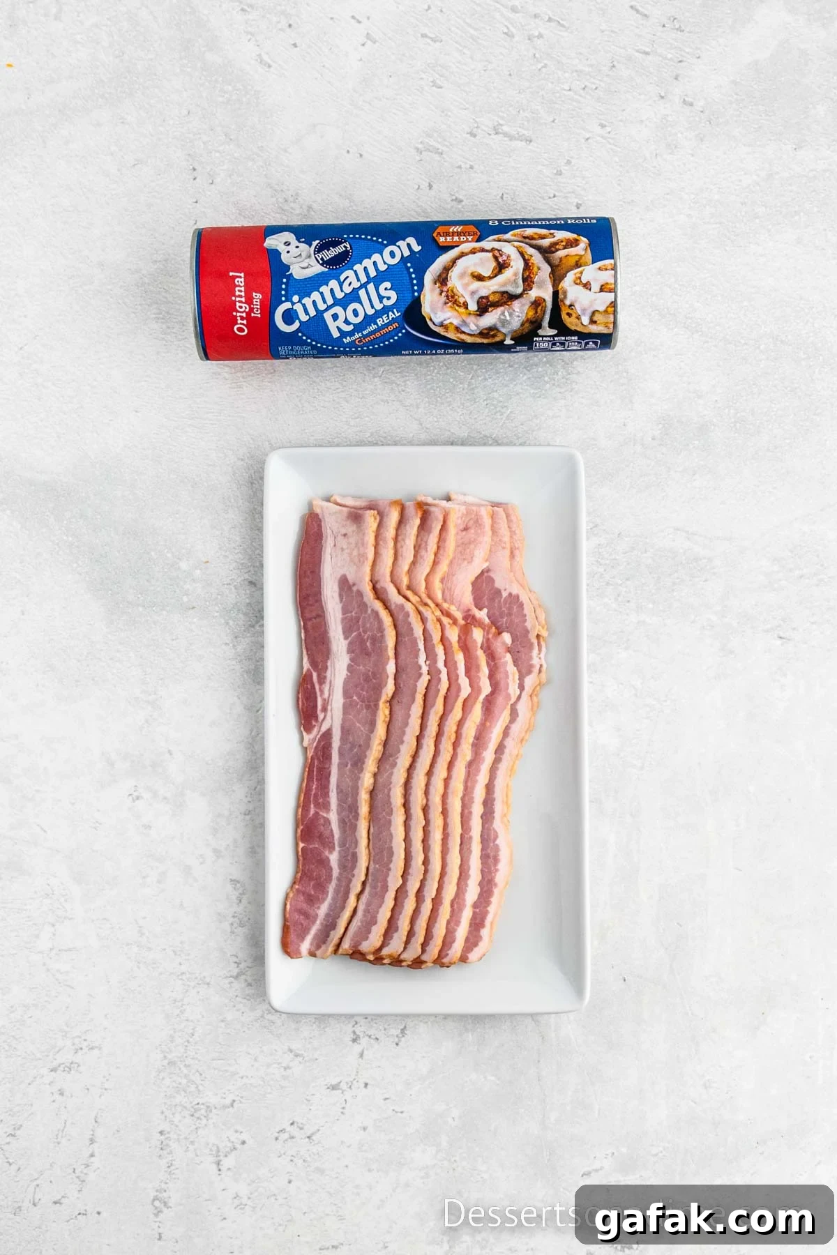 Ingredients for recipe- cinnamon rolls and bacon. 