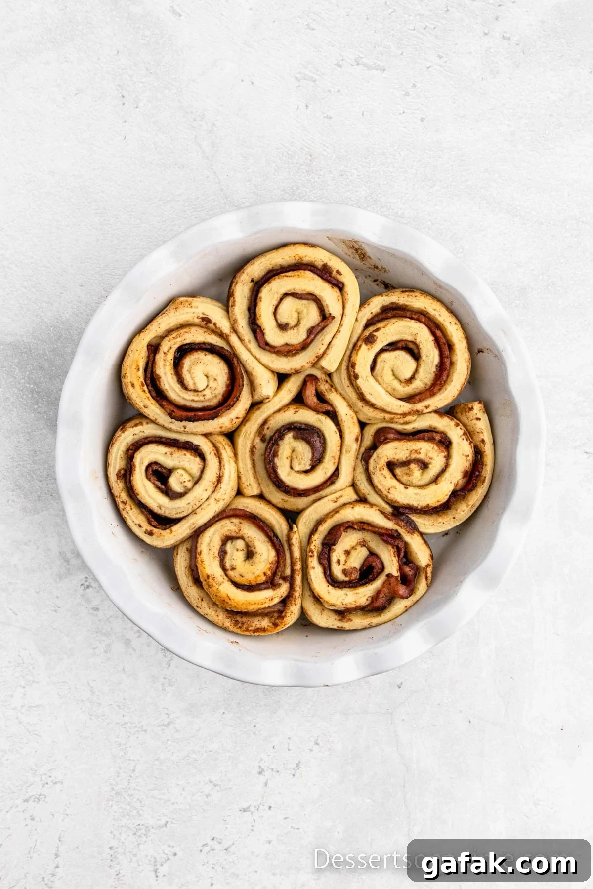 Pan of cinnamon rolls ready to bake. 