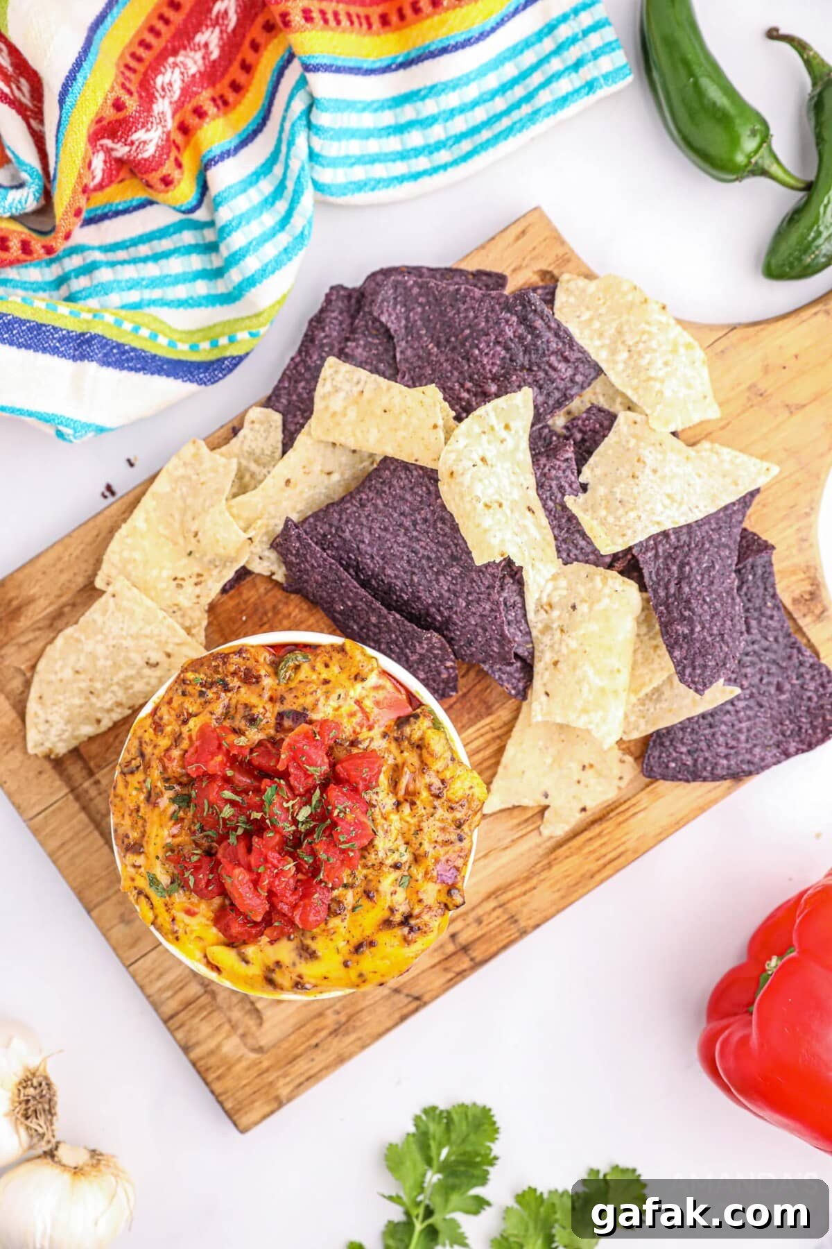 Smoked Queso Dip in bowl with chips