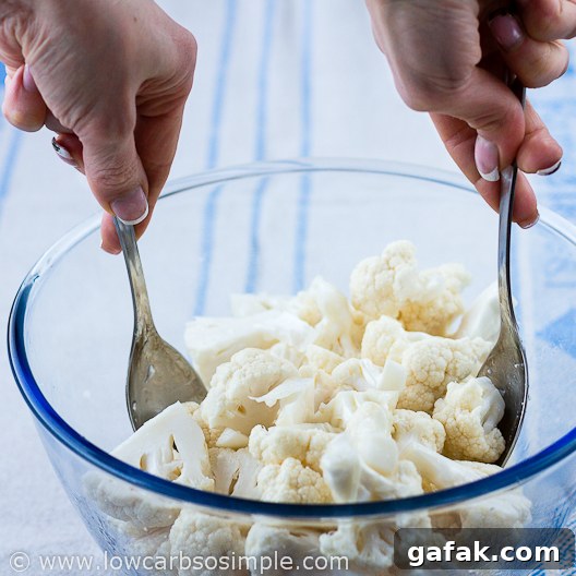 Amazing Cauliflower Poppers; Mixing the Cauliflower and Oil | Low-Carb, So Simple