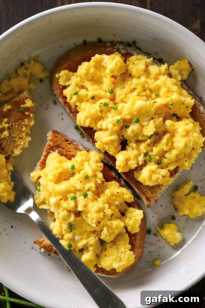 cottage cheese scrambled eggs in a white bowl