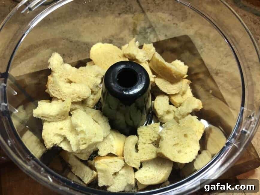 Bread chunks in food processor.