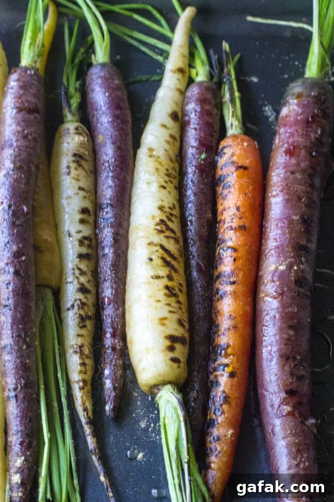 Roasted Honey Carrots - laid on a baking pan