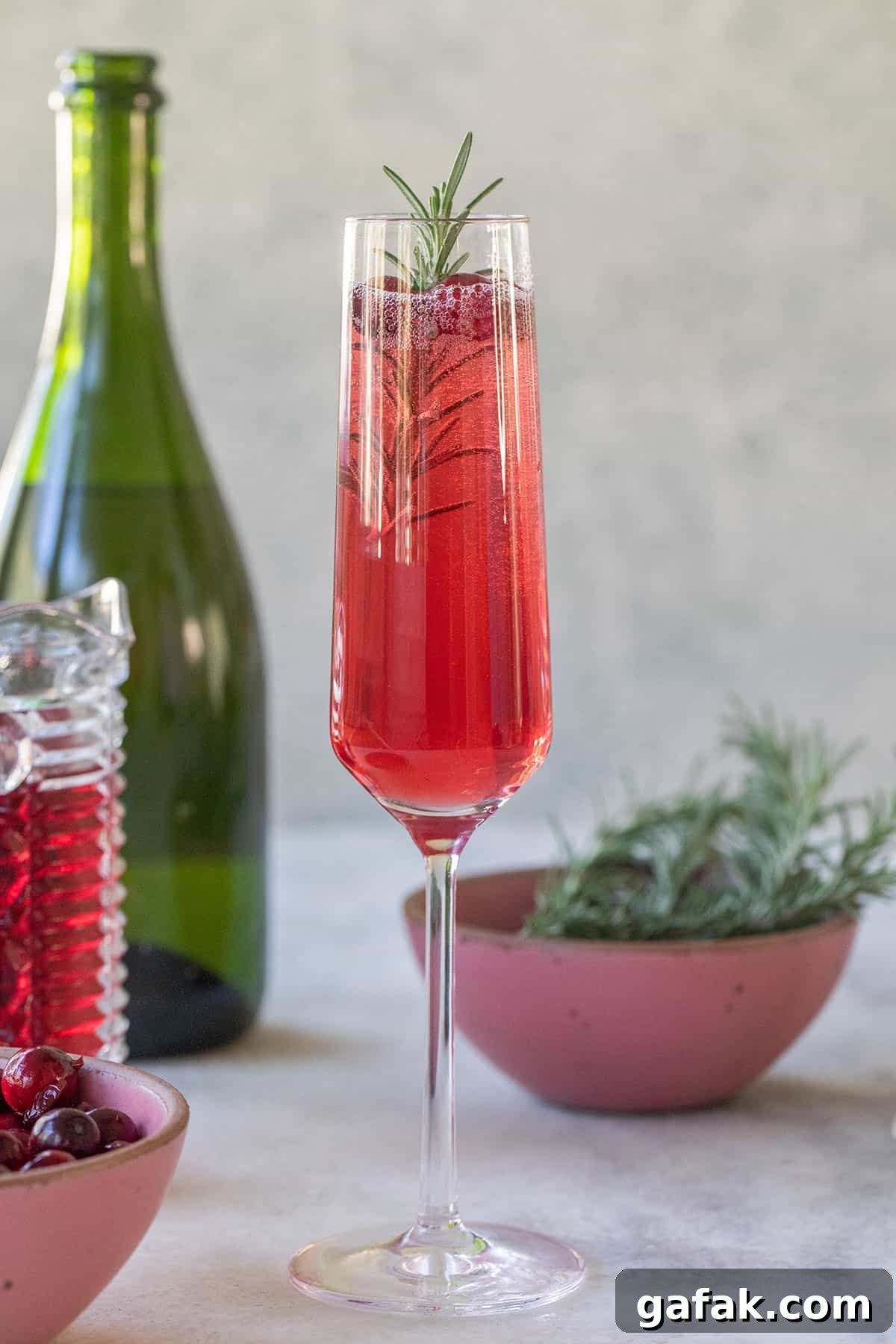 Christmas Champagne Cocktail - chilled champagne flute with cranberry juice.