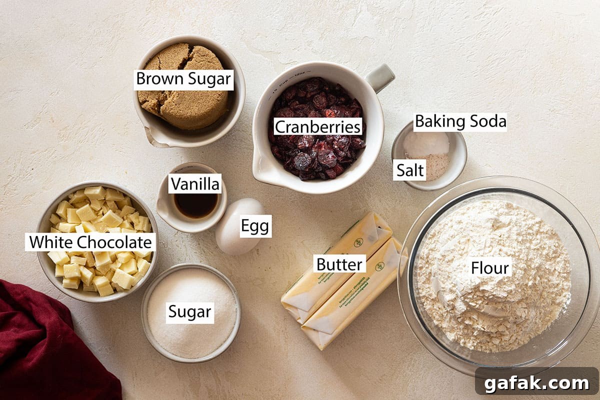 Ingredients: flour, butter, brown sugar, sugar, egg, vanilla, baking soda, salt, white chocolate, dried cranberries.