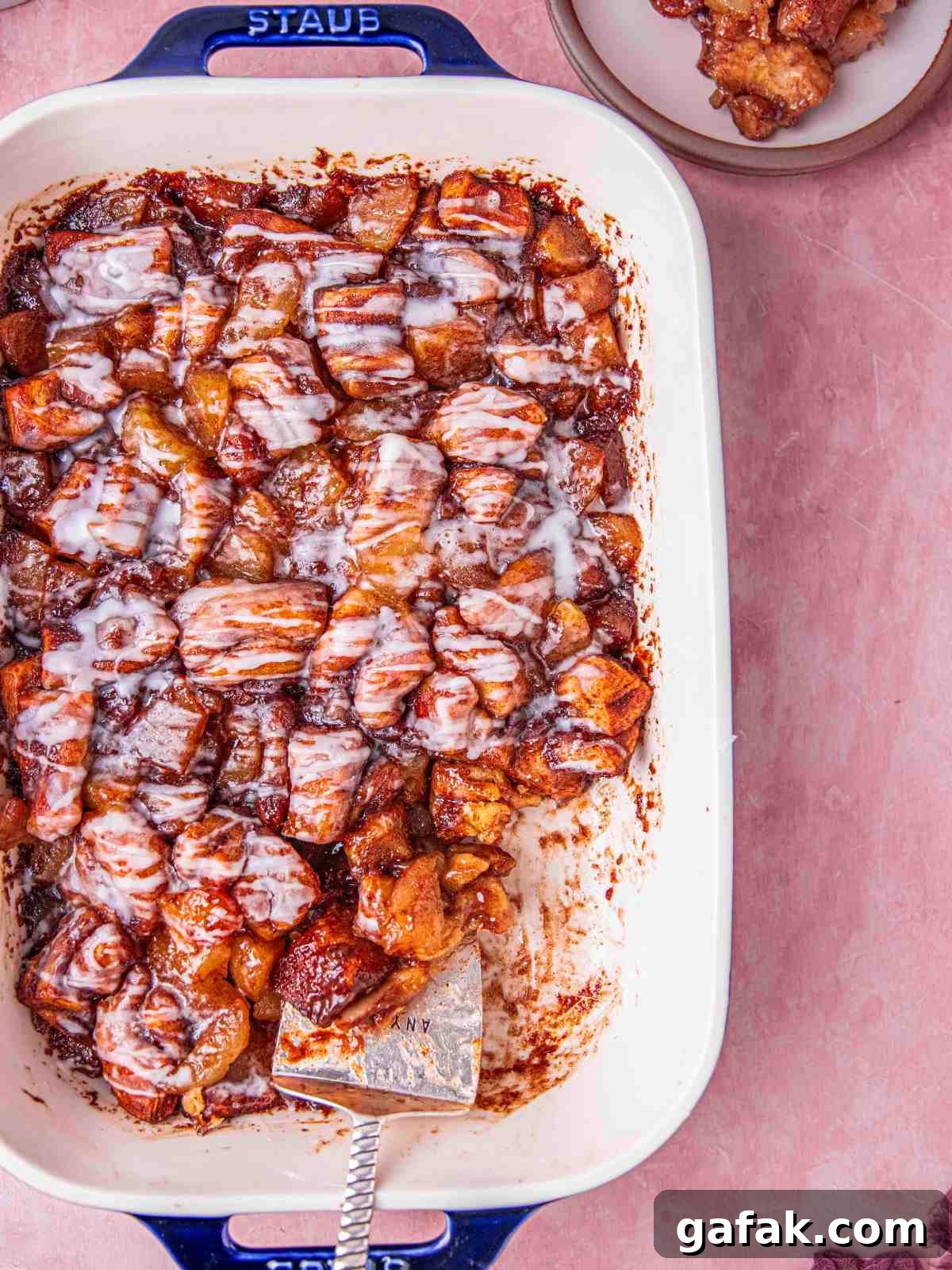Apple Pie-Filled Cinnamon Rolls: Cinnamon Rolls with Apple Filling 2 Cinnamon roll apple pie in a casserole dish.