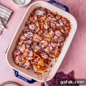 Apple Pie-Filled Cinnamon Rolls: Cinnamon Rolls with Apple Filling 8 cinnamon roll with apple pie drizzled with creamy glaze.