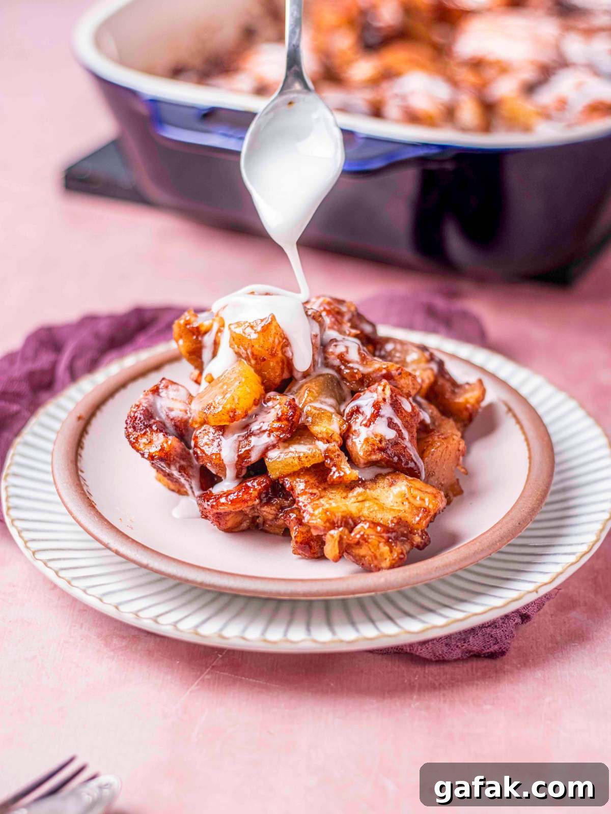 Apple Pie-Filled Cinnamon Rolls: Cinnamon Rolls with Apple Filling 4 Drizzle cream frosting over a slice of pie.