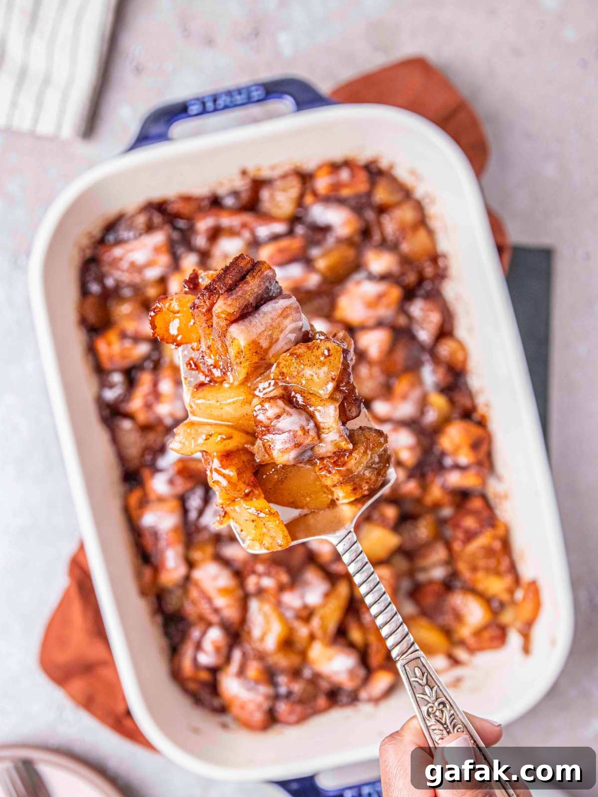Apple Pie-Filled Cinnamon Rolls: Cinnamon Rolls with Apple Filling 7 A slice of the cinnamon roll with apple pie filling.