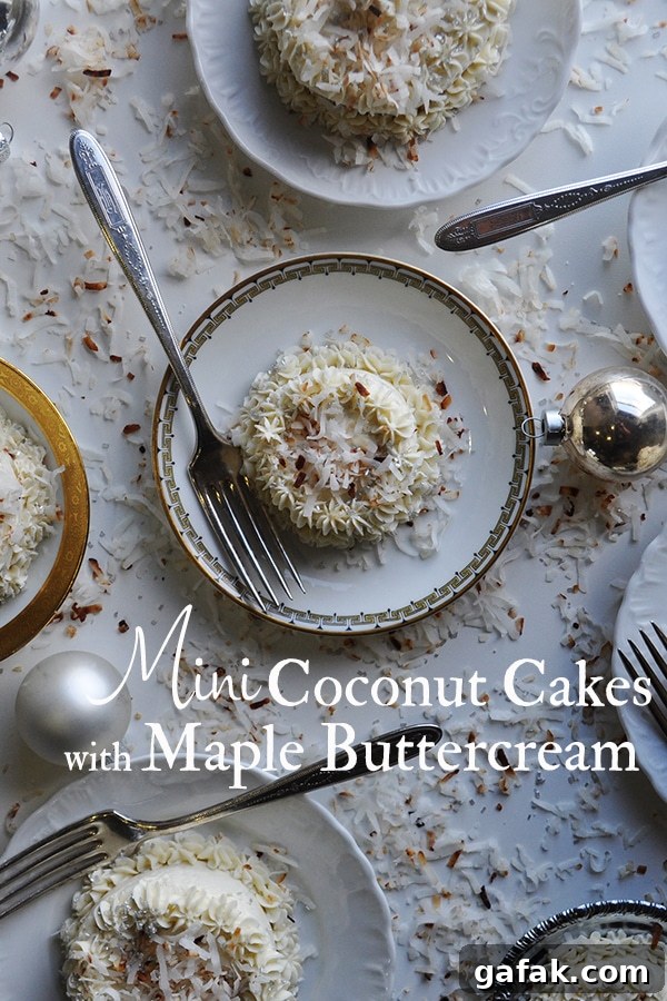 Several plates of mini coconut cakes with maple Italian meringue buttercream.