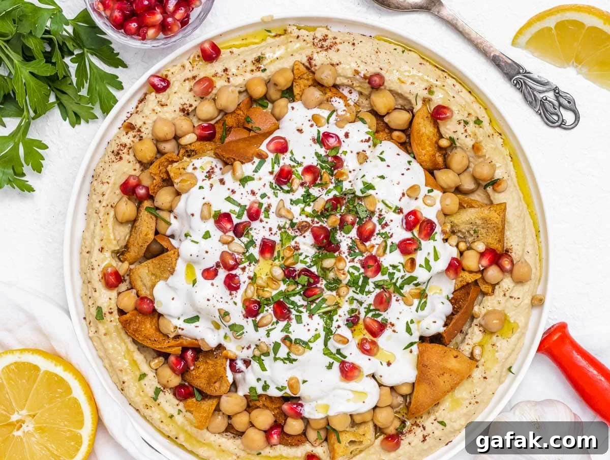 Fatteh with Pita, Hummus, and Creamy Yogurt Bowl 11 Fatteh with yogurt, chickpeas and herbs