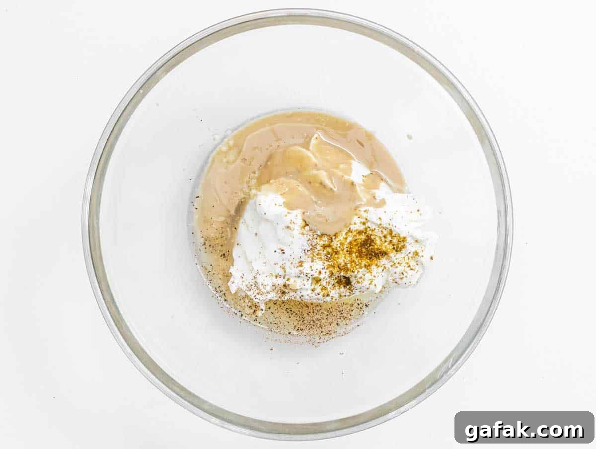 Fatteh with Pita, Hummus, and Creamy Yogurt Bowl 8 yogurt tahini dressing before mixing