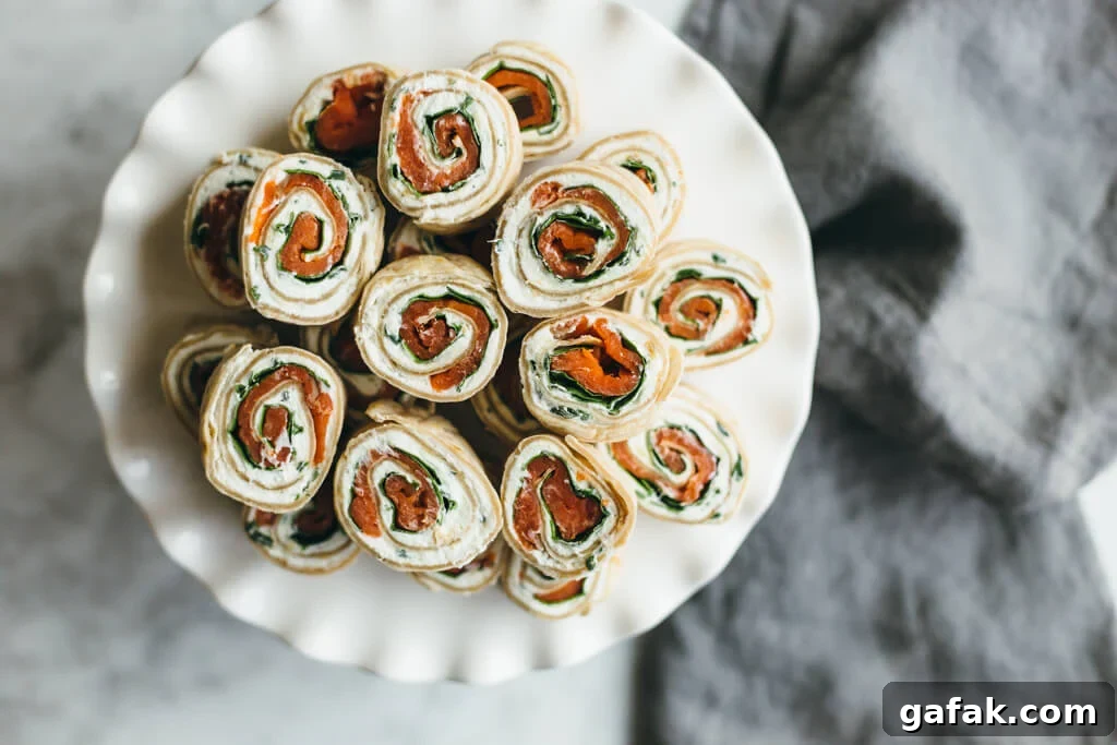 Herbed chevre, spinach and smoked salmon pinwheel. With a cassava flour tortilla. Gluten-free and paleo-friendly.