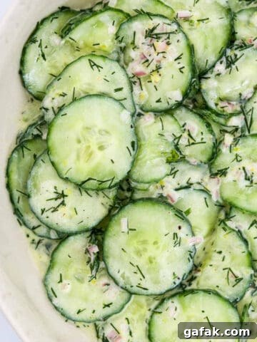 Close up of lemon cucumber salad (featured image).