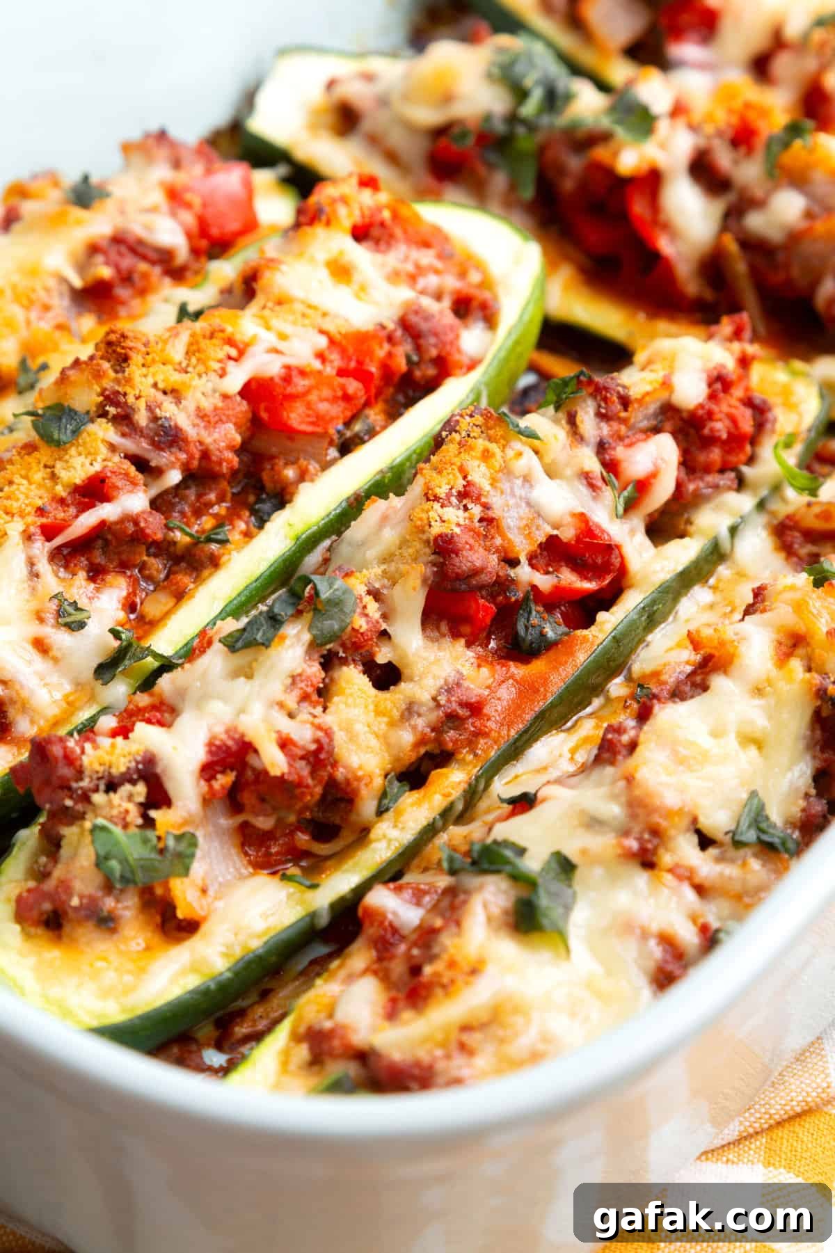 close up image of stuffed zucchini.