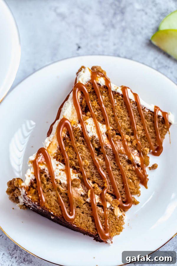 slice of apple crumble cake with salted caramel sauce drizzle 