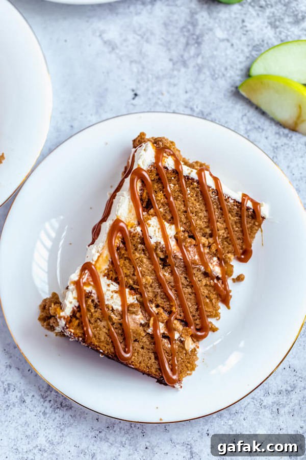 slice of apple crumble cake with salted caramel sauce drizzle 