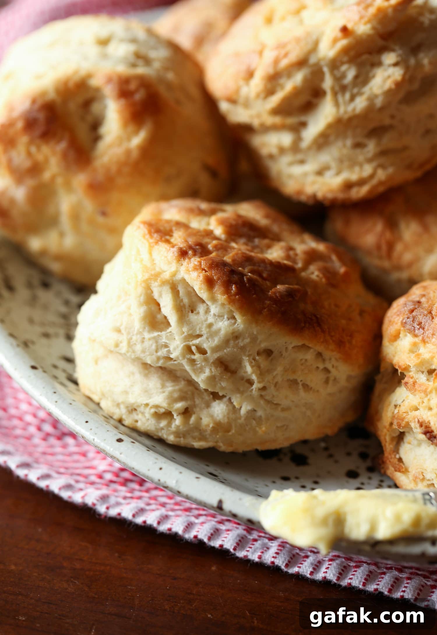 Buttermilk biscuits cooked in an air fryer on a serving platter
