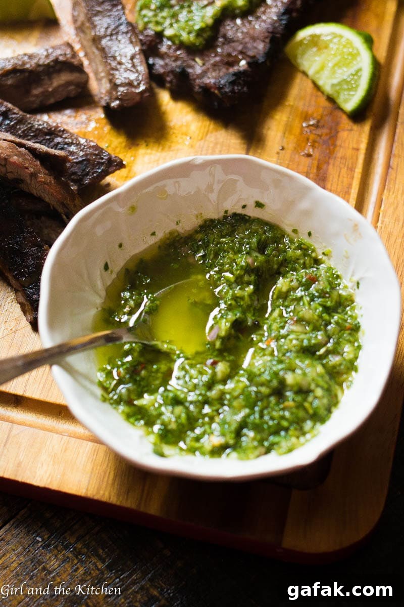 My 5 minute chimichurri sauce has a secret ingredient that sets it apart from the rest! It comes together in just a few minutes with a couple of pulses in the food processor. This sauce packs loads of garlicky flavor and is a perfect sauce, marinade and dip for just about anything!