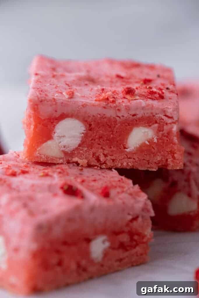 two strawberry brownies stacked on top of each other