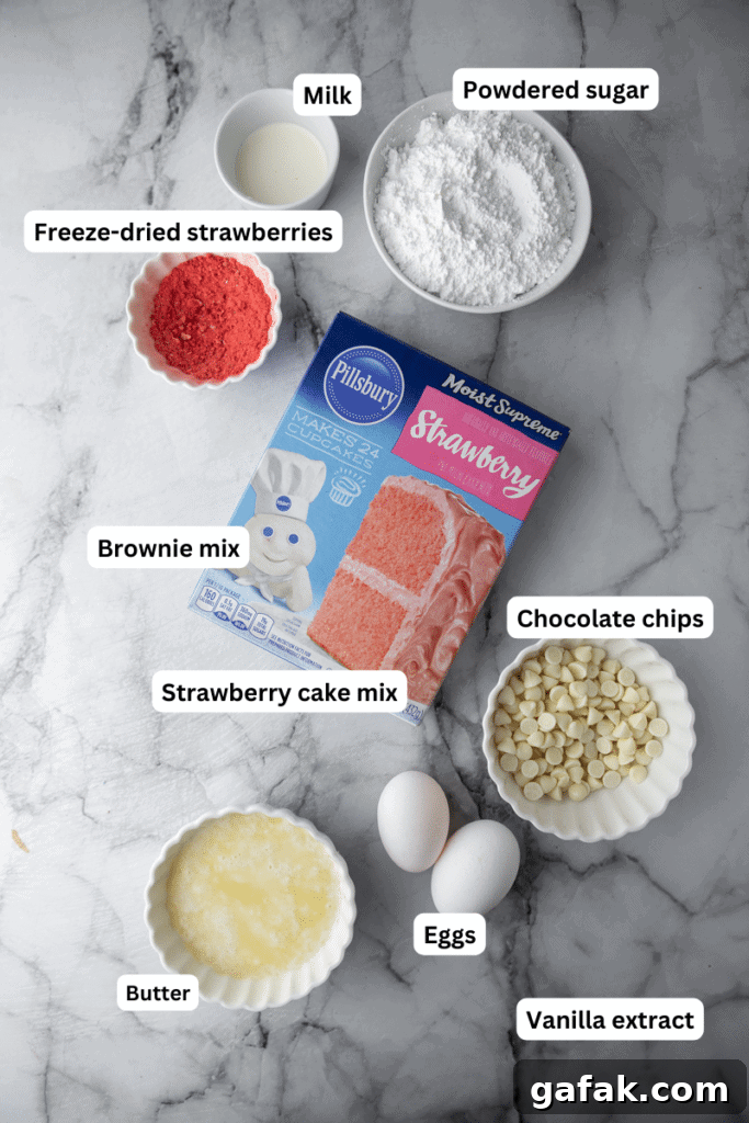 Ingredients for strawberry brownies laid out on a marble surface
