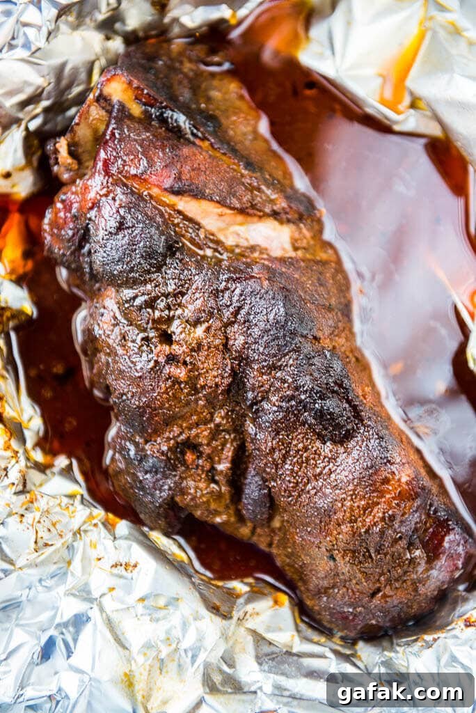 Pulled Pork Sliders that are delicious enough to go up against the best food truck fare! Use your slow cooker or your smoker to make the best pulled pork in town!