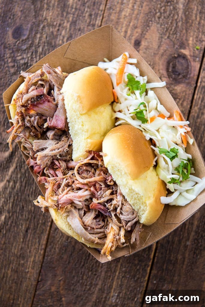 Pulled Pork Sliders that are delicious enough to go up against the best food truck fare! Use your slow cooker or your smoker to make the best pulled pork in town!