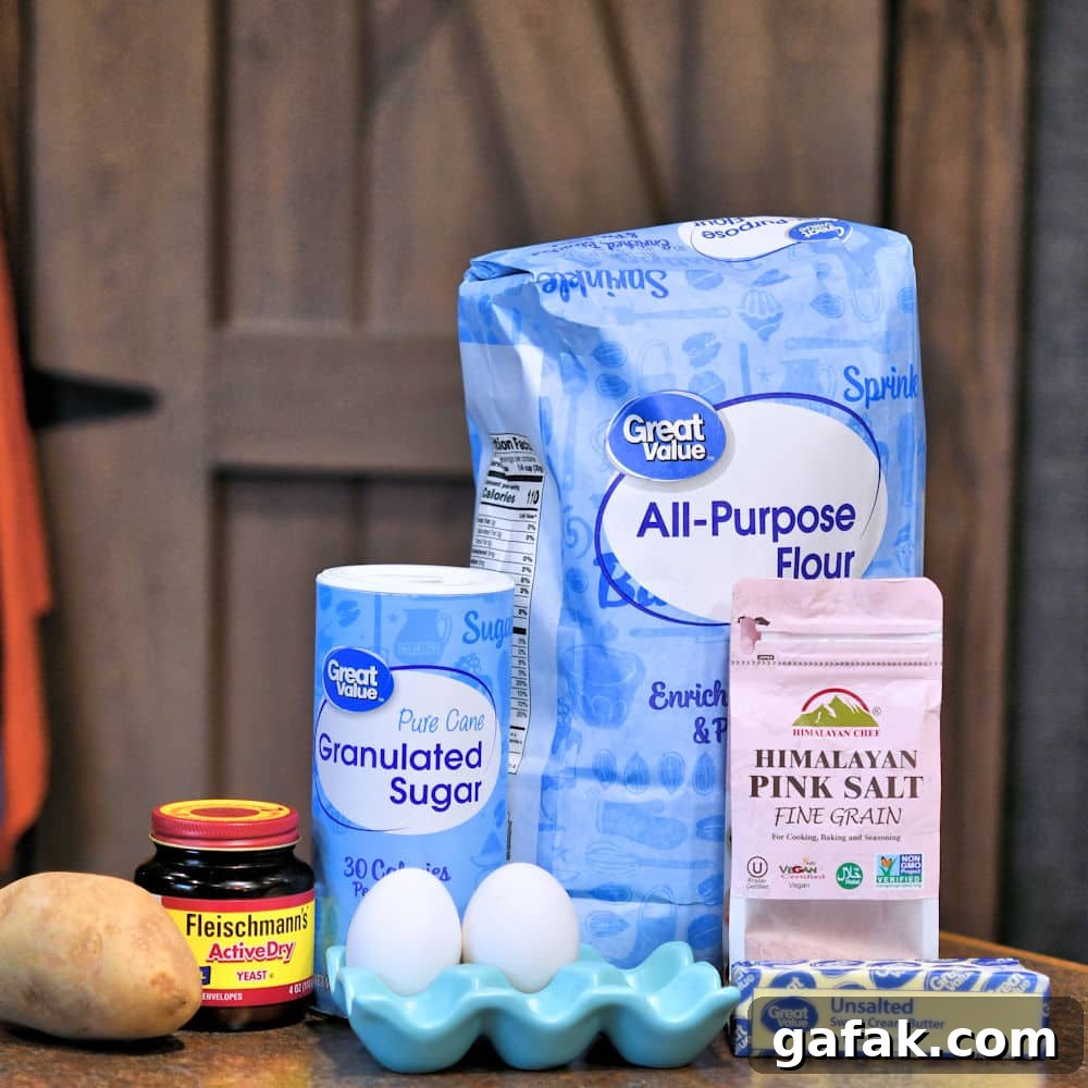 ingredients for potato dinner rolls placed on a counter top
