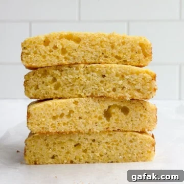 4 slices of small batch cornbread stacked on top of each other.