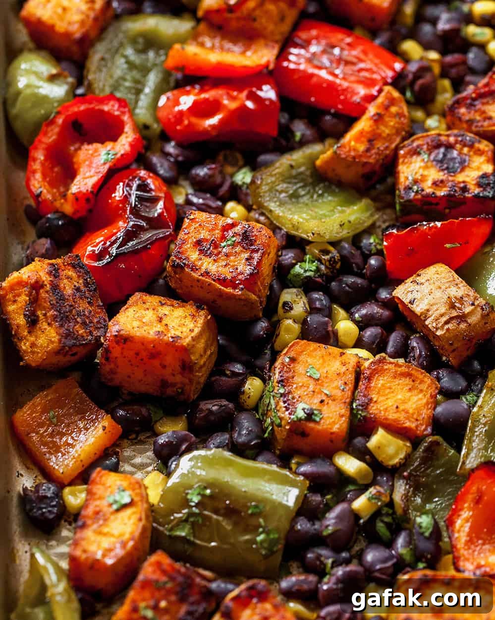black bean sweet potato tacos on a baking sheet