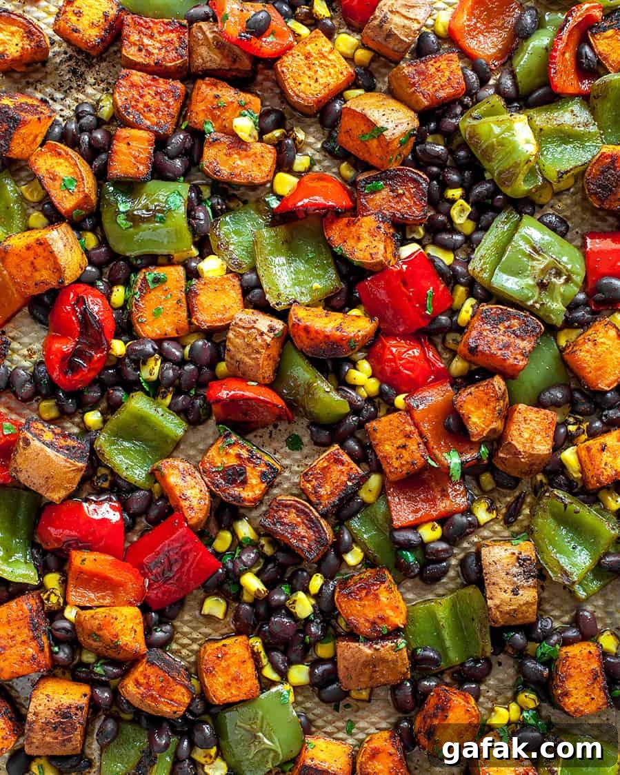 black bean sweet potato tacos on a baking sheet after roasting