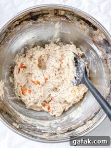 process shot showing mixing batter for persimmon bread in bowl