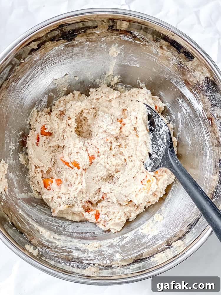 process shot showing mixing batter for persimmon bread in bowl