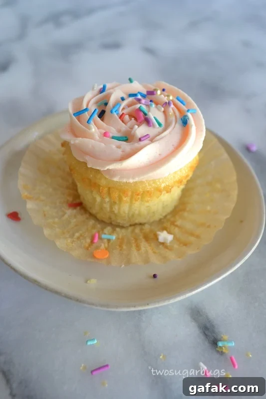 Favorite American Buttercream. Perfect for piping sugar cookies, cakes and cupcakes. #twosugarbugs #americanbuttercream #buttercreamfrosting