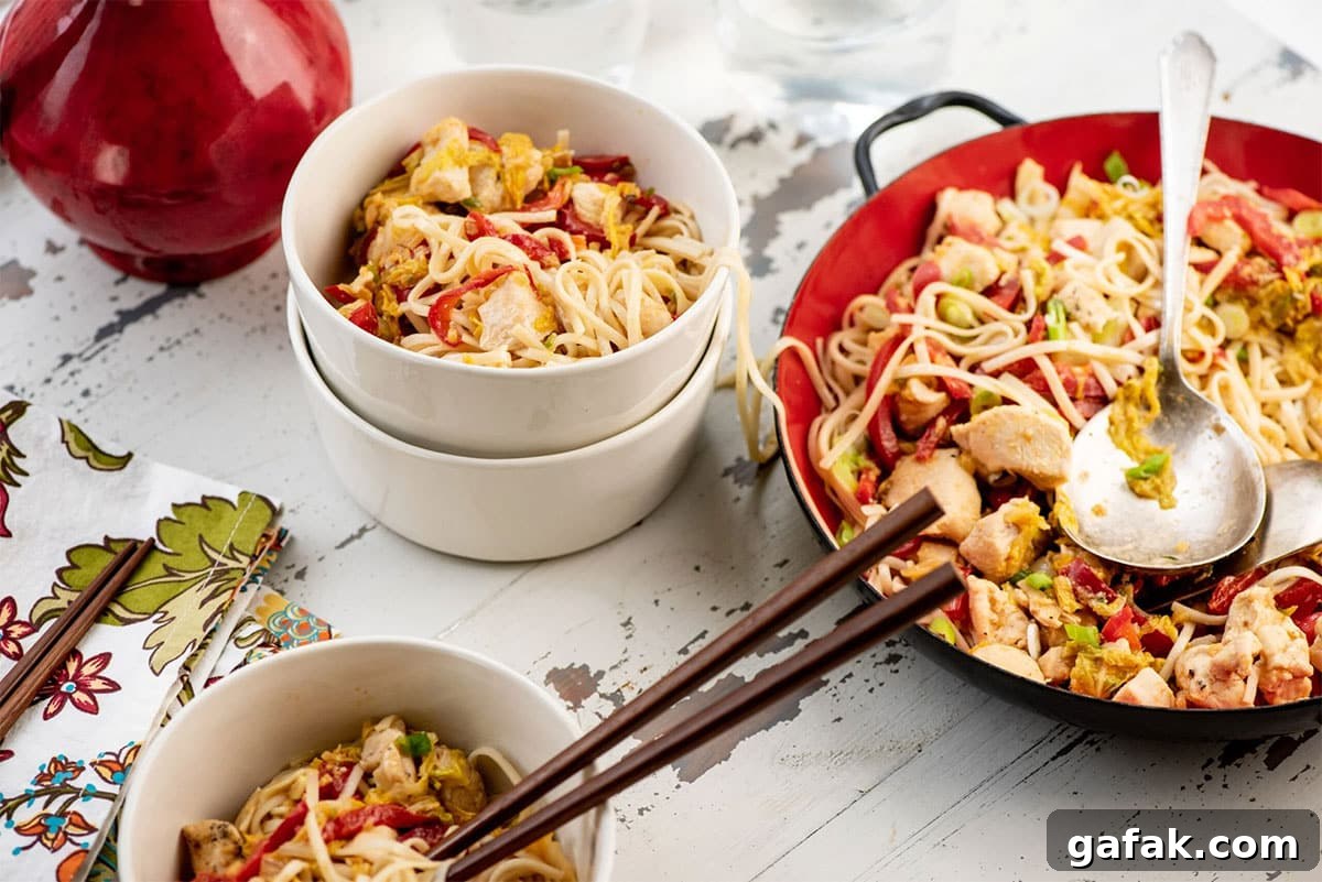 Chicken and Cabbage Stir Fry with Miso Sauce in various bowls.