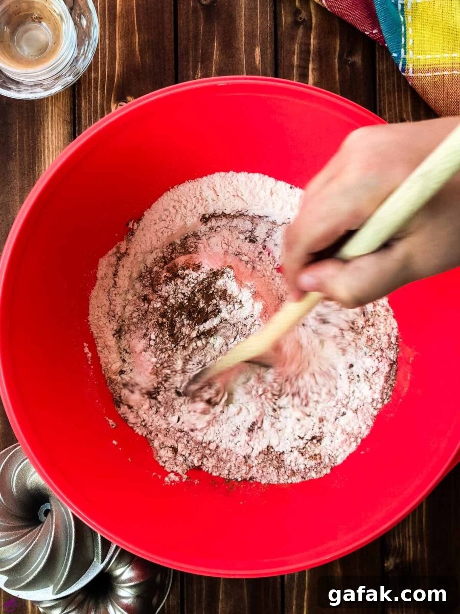 Combine the dry ingredients well, using a wooden spoon.